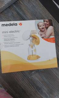 Молокоотсос medela электрический